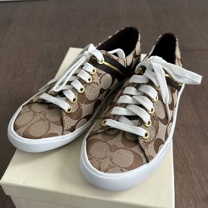 New Coach sneaker shoes.Khaki/ chestnut colour. Never worn.Size 6.Orig. shoe box